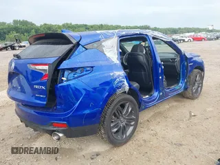2019 Acura RDX w/A-Spec Pkg with VIN 5J8TC2H61KL010144, listed as a IAAI auction lot 42600199 with 80,921 mi miles and . Bid and sale history available at DreamBid. Image 4.