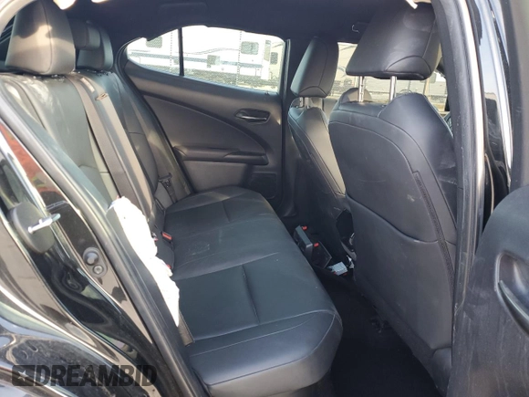 2021 Lexus UX 250h z VIN JTHX9JBH0M2054209, wystawiony jako Copart lot #45482125 z przebiegiem Nie podano mil oraz Szkoda całkowita • Salvage title. Historia ofert i sprzedaży dostępna na DreamBid. Obrazek 12.
