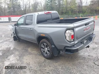 2024 GMC Canyon 4WD AT4 with VIN 1GTP6DEKXR1143138, listed as a IAAI auction lot 41952154 with 26,062 mi miles. Bid and sale history available at carsss.com. Image 3.