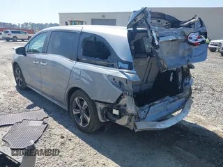 2018 Honda Odyssey Touring with VIN 5FNRL6H84JB070387, listed as a IAAI auction lot 41835852 with 98,662 mi miles. Bid and sale history available at carsss.com. Image 3.
