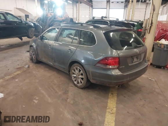 2014 Volkswagen Jetta SportWagen TDI w/Sunroof & Nav with VIN 3VWPL7AJ2EM627998, listed as a IAAI auction lot 41614718 with 134,203 mi miles. Bid and sale history available at carsss.com. Image 3.