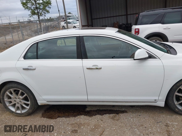 2009 Chevrolet Malibu LTZ with VIN 1G1ZK57719F109877, listed as a IAAI auction lot 41745297 with 151,862 mi miles and . Bid and sale history available at DreamBid. Image 13.