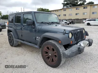 2007 Jeep Wrangler Unlimited X with VIN 1J8GA39107L105101, listed as a Copart auction lot 88559675 with 213,902 mi miles and Salvage title. Bid and sale history available at DreamBid. Image 4.
