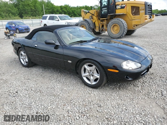 1999 Jaguar XK z VIN SAJGX2044XC031383, wystawiony jako Copart lot #54726925 z przebiegiem 107 696 mil mil oraz Szkody całkowita. Historia ofert i sprzedaży dostępna na DreamBid. Obrazek 4.