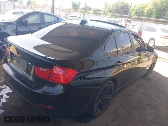 2013 BMW 3 Series 328i with VIN WBA3C1C55DF437400, listed as a IAAI auction lot 42095263 with Not Provided miles and . Bid and sale history available at carsss.com. Image 4.