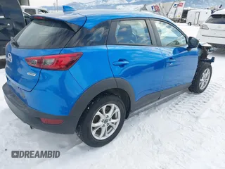 2016 Mazda CX-3 Touring z VIN JM1DKFC72G0138818, wystawiony jako IAAI lot #41371058 z przebiegiem 44 309 mil mil oraz . Historia ofert i sprzedaży dostępna na DreamBid. Obrazek 4.
