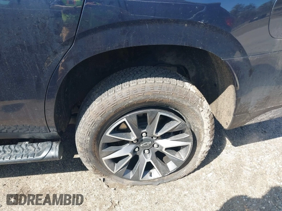 2021 Chevrolet Tahoe Z71 with VIN 1GNSKPKD4MR228894, listed as a IAAI auction lot 42083391 with 40,181 mi miles and . Bid and sale history available at DreamBid. Image 6.