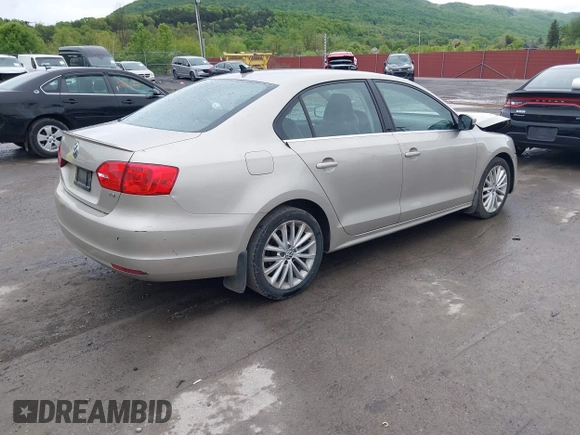 2014 Volkswagen Jetta TDI w/Premium/Nav with VIN 3VWLL7AJ9EM226026, listed as a IAAI auction lot 42219871 with 100,386 mi miles and . Bid and sale history available at DreamBid. Image 4.