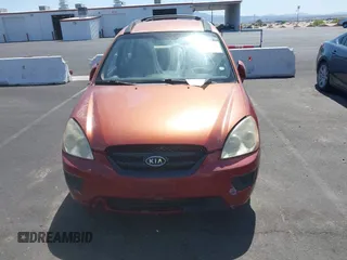 2008 Kia Rondo EX with VIN KNAFG525387174835, listed as a IAAI auction lot 42011406 with 138,656 mi miles. Bid and sale history available at carsss.com. Image 6.