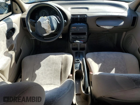 1998 Saturn SL with VIN 1G8ZK5272WZ253120, listed as a Copart auction lot 72911384 with 140,198 mi miles and Salvage title. Bid and sale history available at DreamBid. Image 8.