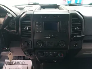 2020 Ford F-150 XL with VIN 1FTEX1EP1LKE45885, listed as a IAAI auction lot 42679224 with 124,413 mi miles and . Bid and sale history available at DreamBid. Image 2.