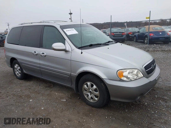 2004 Kia Sedona LX with VIN KNDUP131546535352, listed as a IAAI auction lot 41856784 with 128,943 mi miles. Bid and sale history available at carsss.com. Image 1.