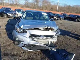 2024 Subaru Impreza z VIN JF1GUABC9R8858653, wystawiony jako IAAI lot #41079258 z przebiegiem 1 073 mil mil oraz . Historia ofert i sprzedaży dostępna na DreamBid. Obrazek 12.