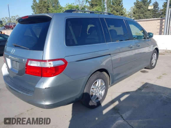 2007 Honda Odyssey EX-L with VIN 5FNRL38727B028976, listed as a IAAI auction lot 42138341 with 169,936 mi miles. Bid and sale history available at carsss.com. Image 4.