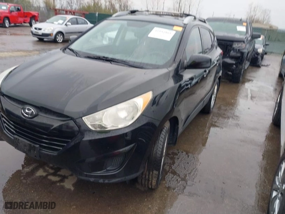 2011 Hyundai Tucson Limited with VIN KM8JUCAC5BU200544, listed as a IAAI auction lot 41952861 with 156,516 mi miles. Bid and sale history available at carsss.com. Image 6.
