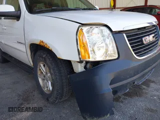 2007 GMC Yukon SLT z VIN 1GKFK13027J332987, wystawiony jako IAAI lot #42265048 z przebiegiem 206 293 mil mil oraz . Historia ofert i sprzedaży dostępna na DreamBid. Obrazek 6.