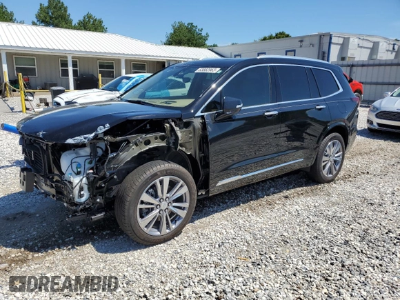 2023 Cadillac XT6 AWD Premium Luxury z VIN 1GYKPFRS2PZ162059, wystawiony jako Copart lot #63882963 z przebiegiem 6 567 mil mil oraz . Historia ofert i sprzedaży dostępna na DreamBid. Obrazek 1.