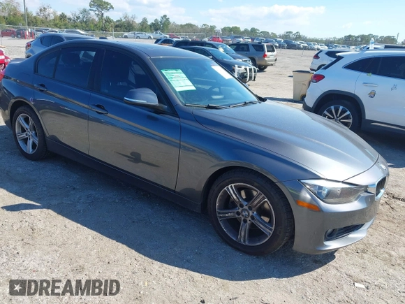 2013 BMW 3 Series 328i with VIN WBA3A5C50DF355734, listed as a IAAI auction lot 41629338 with 120,932 mi miles. Bid and sale history available at carsss.com. Image 1.