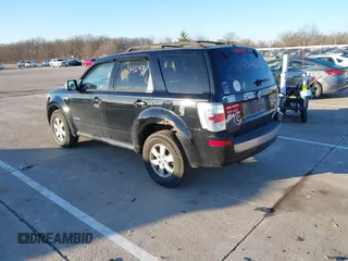 2008 Mercury Mariner with VIN 4M2CU81168KJ26462, listed as a IAAI auction lot 41454643 with 214,873 mi miles and . Bid and sale history available at DreamBid. Image 3.