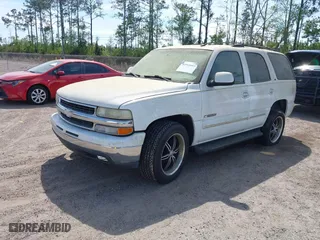 2003 Chevrolet Tahoe LS with VIN 1GNEC13ZX3R281468, listed as a IAAI auction lot 41911693 with 149,387 mi miles. Bid and sale history available at carsss.com. Image 2.