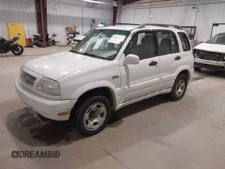 2000 Suzuki Grand Vitara JLX z VIN JS3TD62V1Y4119064, wystawiony jako IAAI lot #40845963 z przebiegiem 339 219 mil mil oraz . Historia ofert i sprzedaży dostępna na DreamBid. Obrazek 2.