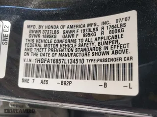 2007 Honda Civic Sdn EX with VIN 1HGFA16857L134510, listed as a IAAI auction lot 41887567 with 88,000 mi miles. Bid and sale history available at carsss.com. Image 9.