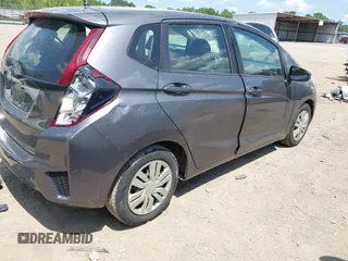 2015 Honda Fit LX with VIN 3HGGK5G57FM747786, listed as a IAAI auction lot 42656703 with 102,637 mi miles and . Bid and sale history available at DreamBid. Image 4.