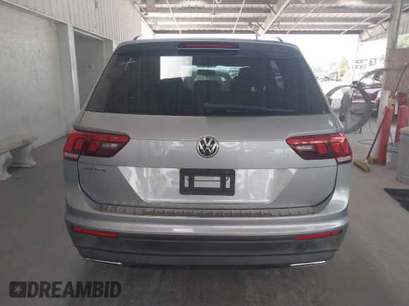 2019 Volkswagen Tiguan S with VIN 3VV1B7AX6KM189497, listed as a IAAI auction lot 42669313 with 236,719 mi miles and . Bid and sale history available at DreamBid. Image 16.