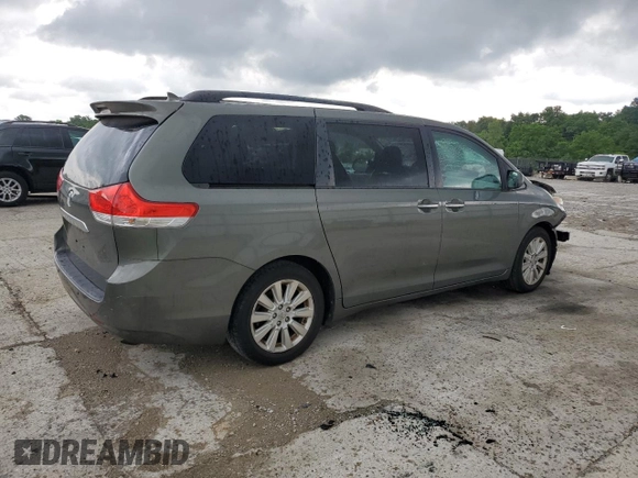 2011 Toyota Sienna XLE AAS with VIN 5TDYK3DC9BS120799, listed as a Copart auction lot 61470045 with 194,422 mi miles and Salvage title. Bid and sale history available at DreamBid. Image 3.