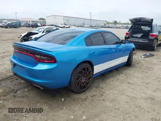 2015 Dodge Charger RT with VIN 2C3CDXCTXFH918878, listed as a IAAI auction lot 41953418 with 110,202 mi miles and . Bid and sale history available at DreamBid. Image 4.