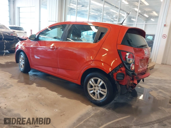 2012 Chevrolet Sonic LT z VIN 1G1JD6SB1C4230890, wystawiony jako IAAI lot #41265634 z przebiegiem 161 886 mil mil oraz . Historia ofert i sprzedaży dostępna na DreamBid. Obrazek 3.