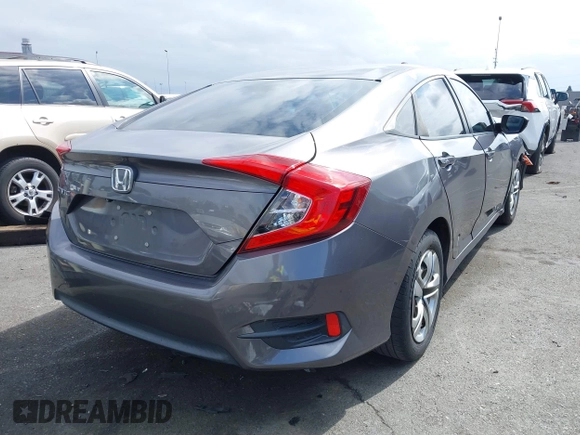 2018 Honda Civic LX with VIN 2HGFC2F58JH514161, listed as a IAAI auction lot 42073133 with 117,658 mi miles. Bid and sale history available at carsss.com. Image 4.