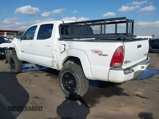 2007 Toyota Tacoma PreRunner z VIN 3TMJU62N87M029323, wystawiony jako IAAI lot #41462575 z przebiegiem 211 104 mil mil oraz . Historia ofert i sprzedaży dostępna na DreamBid. Obrazek 3.