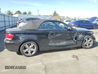 2009 BMW 1 Series 128i with VIN WBAUN13529VH81121, listed as a Copart auction lot 77849094 with 30,756 mi miles and Salvage Title. Bid and sale history available at DreamBid. Image 3.