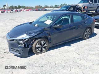 2016 Honda Civic EX-L with VIN 19XFC1F72GE044319, listed as a IAAI auction lot 41823220 with 129,868 mi miles and . Bid and sale history available at DreamBid. Image 17.