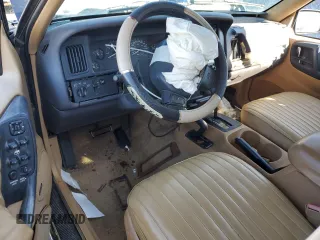 1997 Jeep Grand Cherokee Limited with VIN 1J4GZ78Y1VC598820, listed as a Copart auction lot 46398505 with 259,241 mi miles and Salvage Title. Bid and sale history available at carsss.com. Image 8.