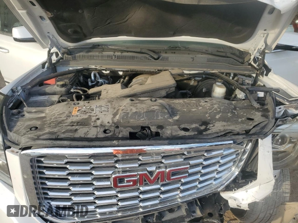 2019 GMC Yukon Denali with VIN 1GKS1CKJ7KR370524, listed as a Copart auction lot 77344394 with 39,753 mi miles and Salvage Title. Bid and sale history available at carsss.com. Image 12.