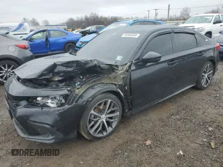 2024 Honda Civic Touring z VIN 2HGFE1F97RH316075, wystawiony jako Copart lot #50006805 z przebiegiem Nie podano mil oraz Szkoda całkowita • Salvage title. Historia ofert i sprzedaży dostępna na DreamBid. Obrazek 1.