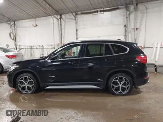 2018 BMW X1 xDrive28i with VIN WBXHT3C30J5K29383, listed as a IAAI auction lot 41503314 with 107,678 mi miles. Bid and sale history available at carsss.com. Image 14.