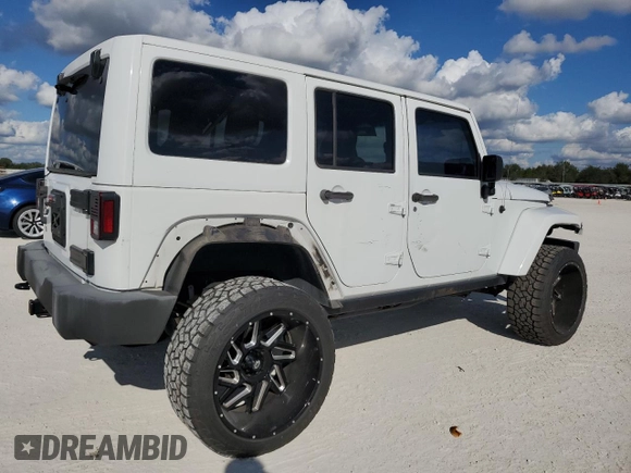 2015 Jeep Wrangler Unlimited Sahara with VIN 1C4BJWEG6FL614671, listed as a Copart auction lot 86052284 with 92,894 mi miles and Salvage title. Bid and sale history available at DreamBid. Image 3.