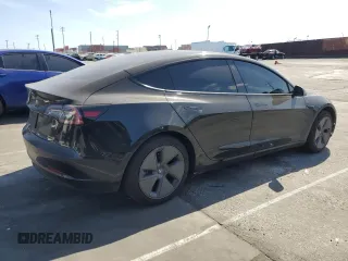 2022 Tesla Model 3 with VIN 5YJ3E1EAXNF120970, listed as a Copart auction lot 47631725 with 33,205 mi miles and Salvage Title. Bid and sale history available at DreamBid. Image 3.