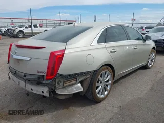2013 Cadillac XTS Luxury with VIN 2G61P5S30D9132193, listed as a IAAI auction lot 41897709 with 140,780 mi miles and . Bid and sale history available at DreamBid. Image 4.