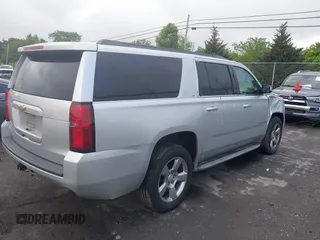 2015 Chevrolet Suburban LT z VIN 1GNSCJKC2FR144528, wystawiony jako IAAI lot #42320028 z przebiegiem 226 076 mil mil oraz . Historia ofert i sprzedaży dostępna na DreamBid. Obrazek 4.