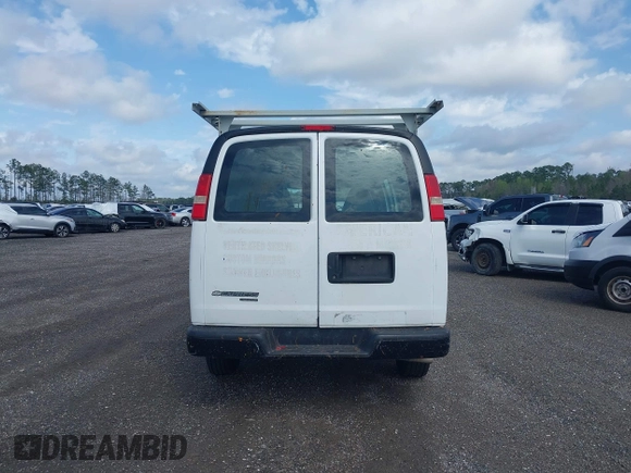 2013 Chevrolet Express Cargo with VIN 1GCWGFBA7D1110560, listed as a IAAI auction lot 41730234 with 185,291 mi miles and . Bid and sale history available at DreamBid. Image 16.