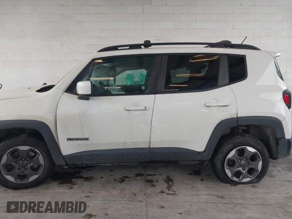2015 Jeep Renegade Latitude with VIN ZACCJBBH7FPB51994, listed as a IAAI auction lot 41658051 with 95,580 mi miles. Bid and sale history available at carsss.com. Image 15.