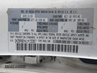 2020 Mazda 3 Premium with VIN 3MZBPBEMXLM133357, listed as a IAAI auction lot 41540234 with 81,280 mi miles and . Bid and sale history available at DreamBid. Image 9.