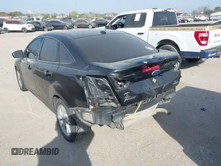 2014 Ford Focus SE with VIN 1FADP3F22EL451580, listed as a IAAI auction lot 41755100 with 1 mi miles. Bid and sale history available at carsss.com. Image 3.