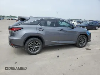 2022 Lexus RX with VIN 2T2YZMDA9NC328156, listed as a Copart auction lot 55418324 with 24,233 mi miles and Salvage Title. Bid and sale history available at carsss.com. Image 3.