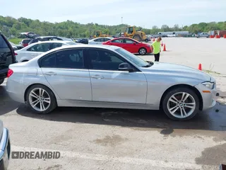 2014 BMW 3 Series 328i xDrive with VIN WBA3B5C51EP543588, listed as a IAAI auction lot 42105211 with 117,717 mi miles and . Bid and sale history available at DreamBid. Image 13.