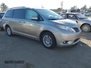 2015 Toyota Sienna XLE with VIN 5TDYK3DC3FS685376, listed as a IAAI auction lot 41727714 with 63,909 mi miles. Bid and sale history available at carsss.com. Image 1.